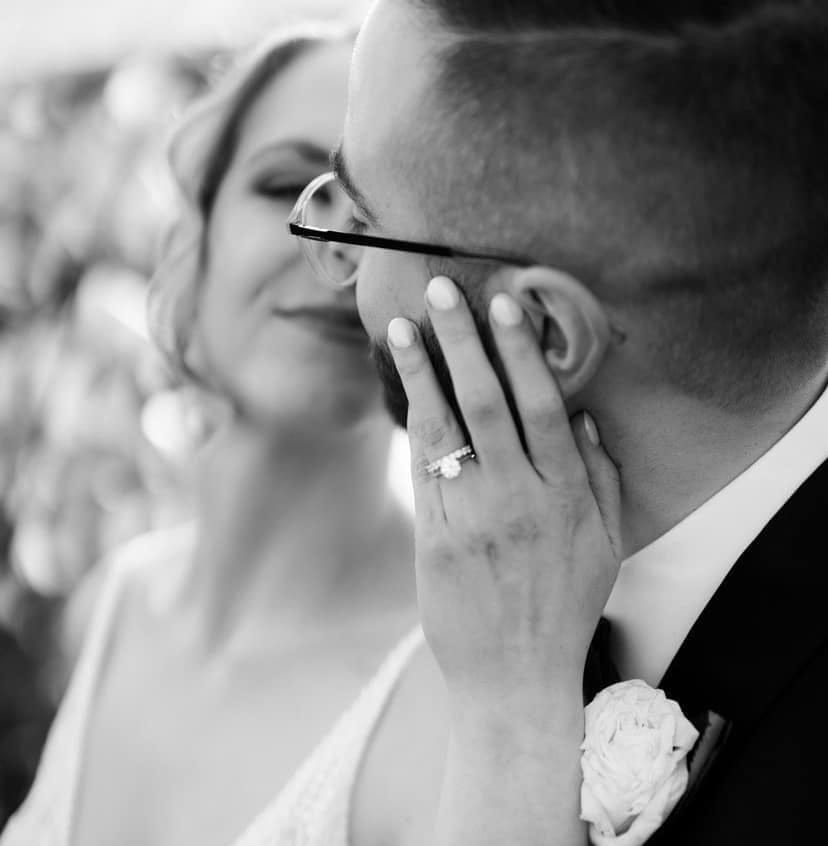 Happy couple, wedding photo, six claw diamond solitaire engagement ring with clawset diamond band, Eltham jeweller, Melbourne, Australia