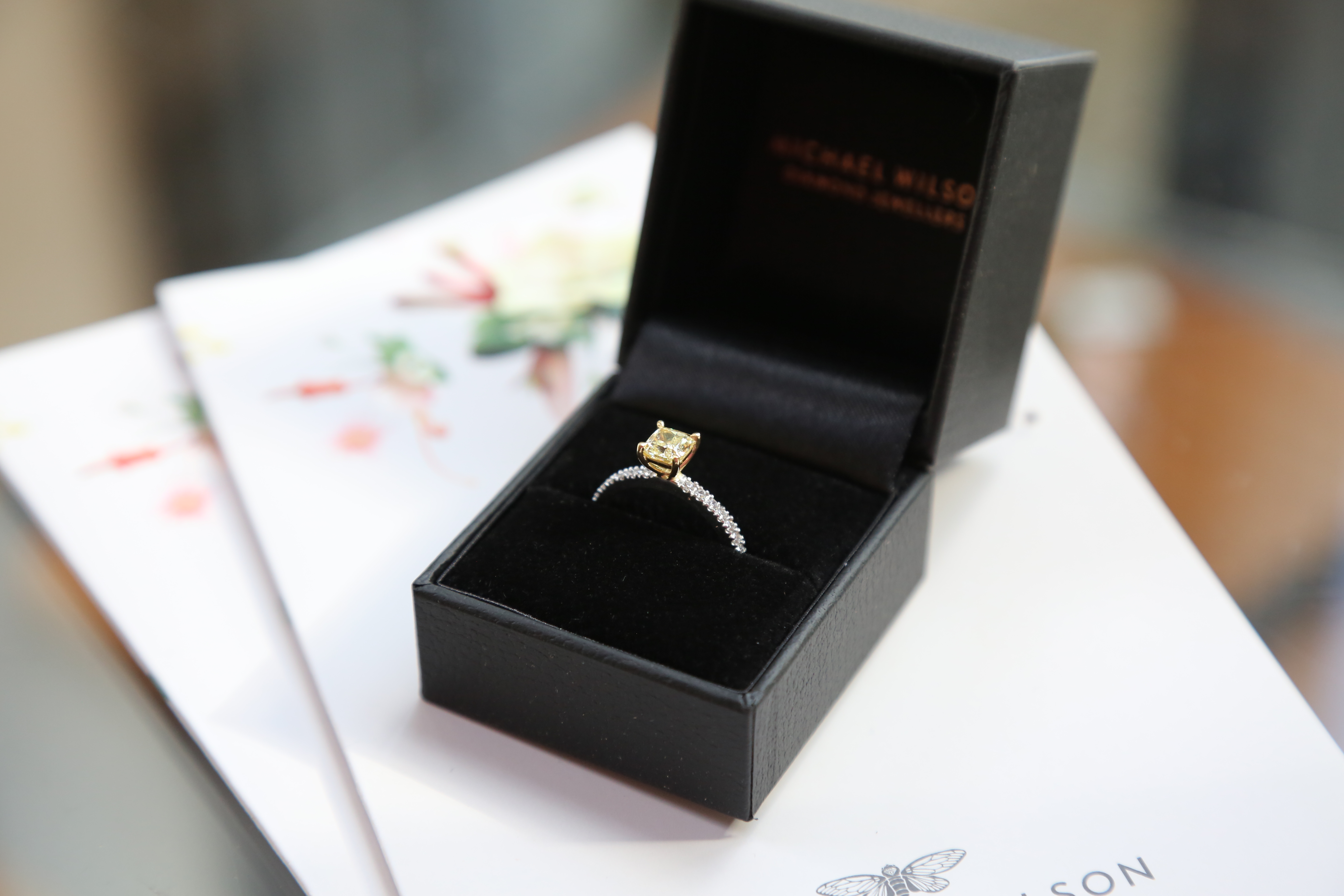 Fancy light coloured yellow cushion diamond solitaire ring with diamond shoulders, Eltham jeweller, Melbourne, Australia, engagement rings