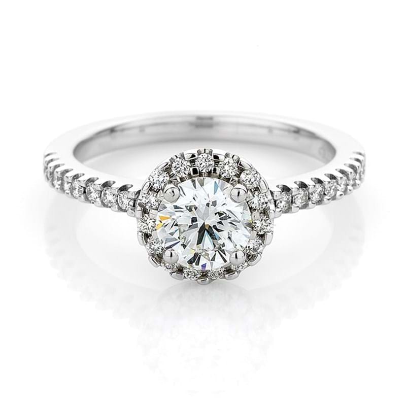 Halo diamond ring, engagement ring, diamond shoulders, timeless design, engagement ring shopping