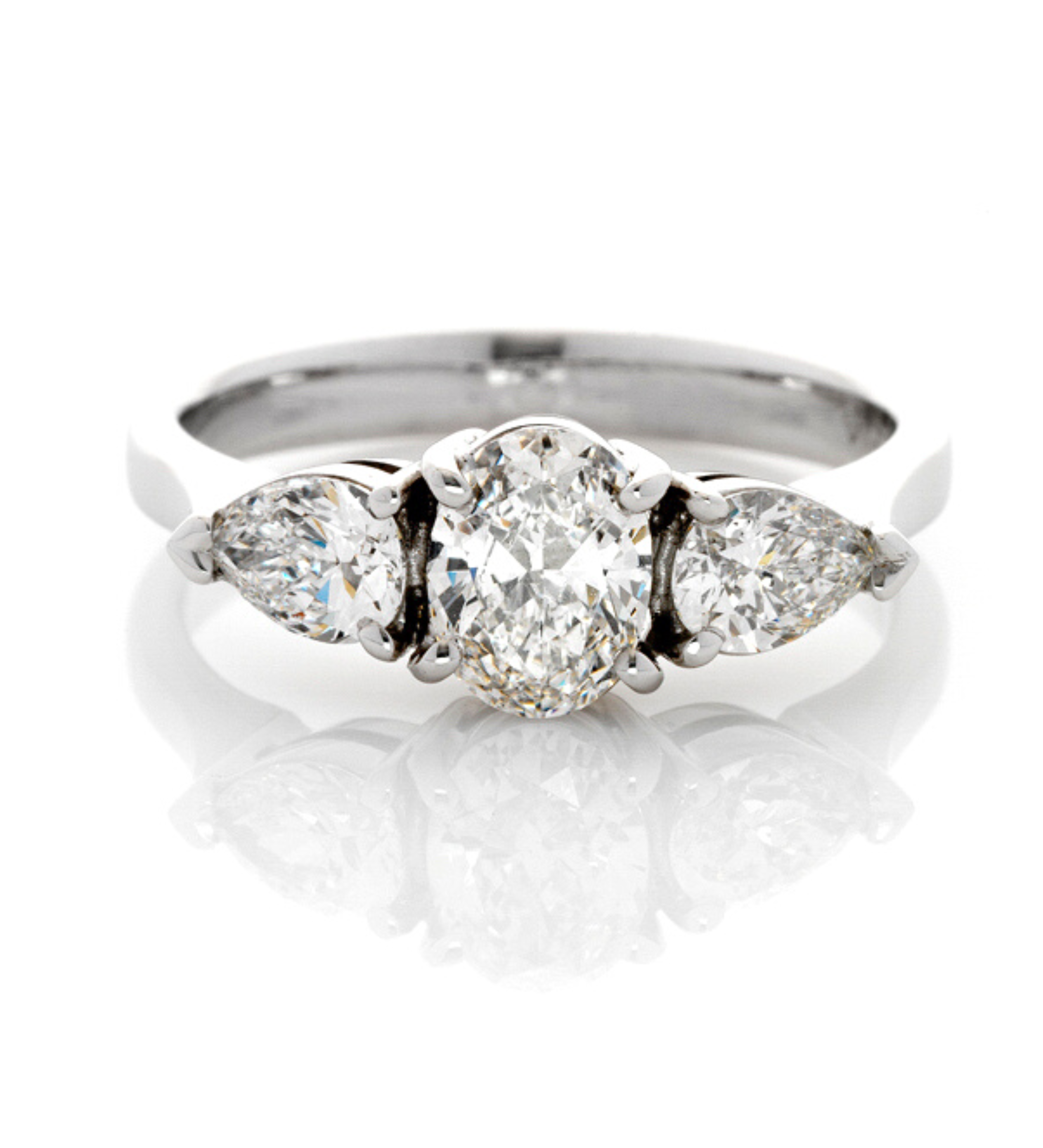Three stone diamond engagement ring, oval centre diamond, side pear diamonds, trilogy ring, Eltham jeweller, Melbourne, Australia