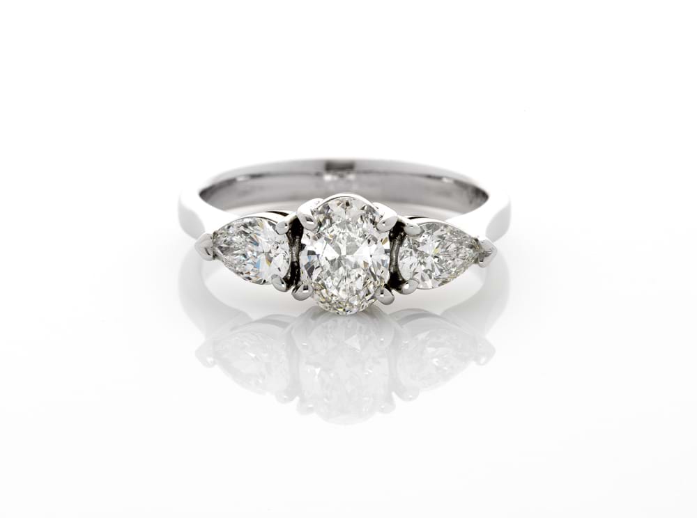 Three stone azena engagement ring, side pear diamonds, oval centre stone, engagement rings, Melbourne Australia