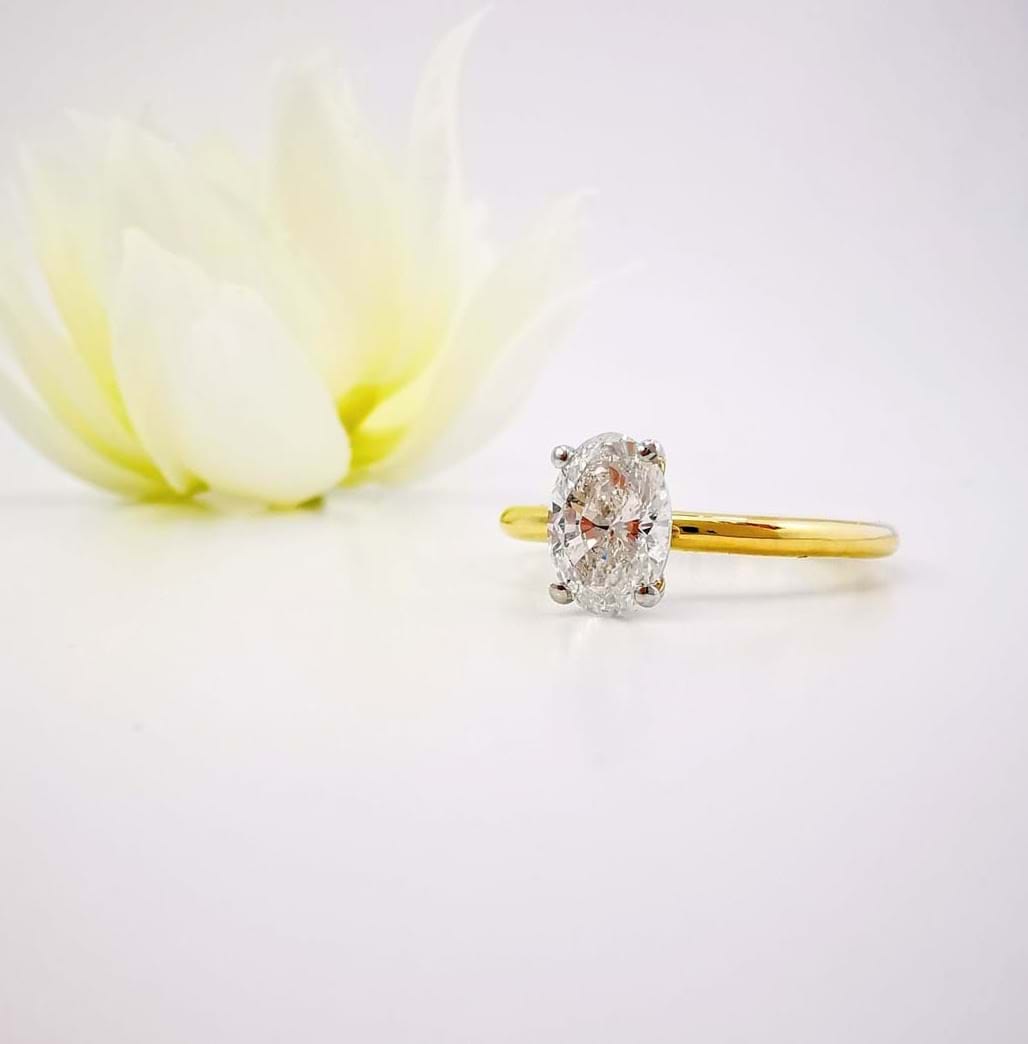 Oval diamond solitaire engagement ring, four claws, yellow gold, Melbourne jeweller, Eltham, Australia