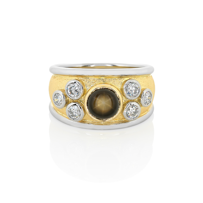 Black star sapphire with diamond in wide yellow and white gold rimmed band, Melbourne Australia