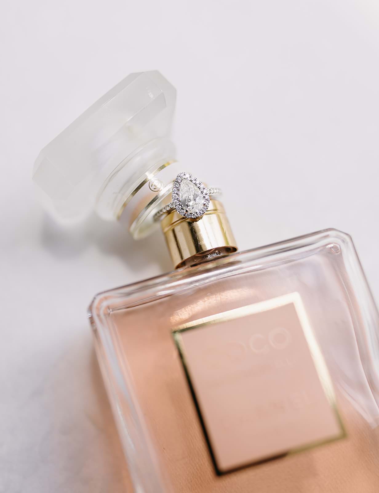 Pear shape engagement ring, teardrop diamond, halo ring, Eltham jeweller, Coco Chanel perfume bottle, wedding photography, beautiful rings, flattering rings, Eltham jeweller, Melbourne, Australia