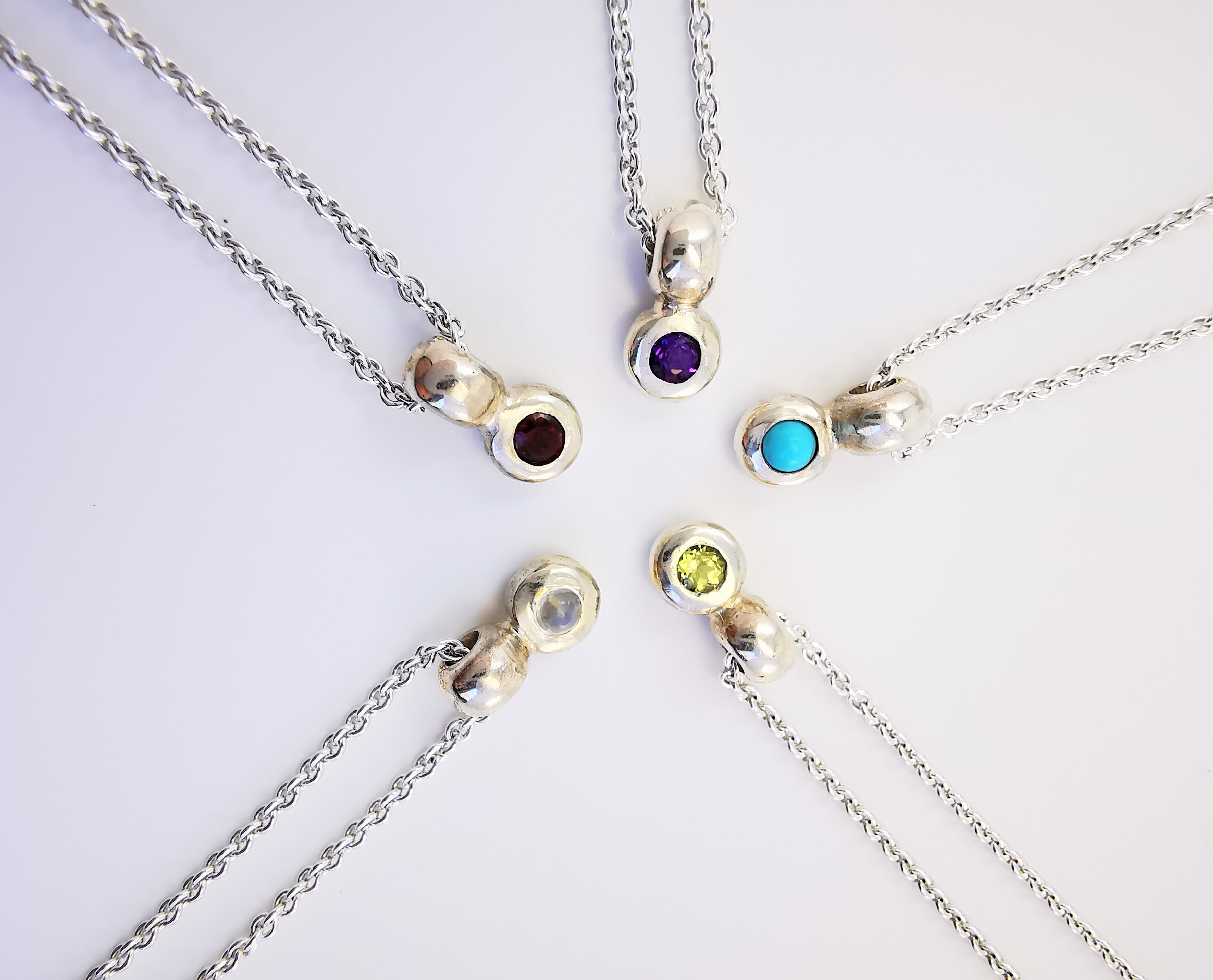 Birthstone charm pendants, gemstones, garnet, moonstone, amethyst, peridot, turquoise, sterling silver, Eltham, Melbourne, Australia 