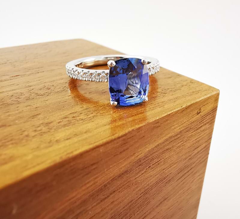 Blue sapphire cushion cut ring with diamond shoulders, engagement rings, gemstone rings, beautiful rings, handcrafted rings, classic rings, engagement rings online, jewellery shop online, Eltham jewellery shop, Melbourne, Australia