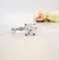 Bespoke engagement ring, custom made, cushion cut 2ct diamond, marquise diamond band, Eltham jeweller, Melbourne, Australia