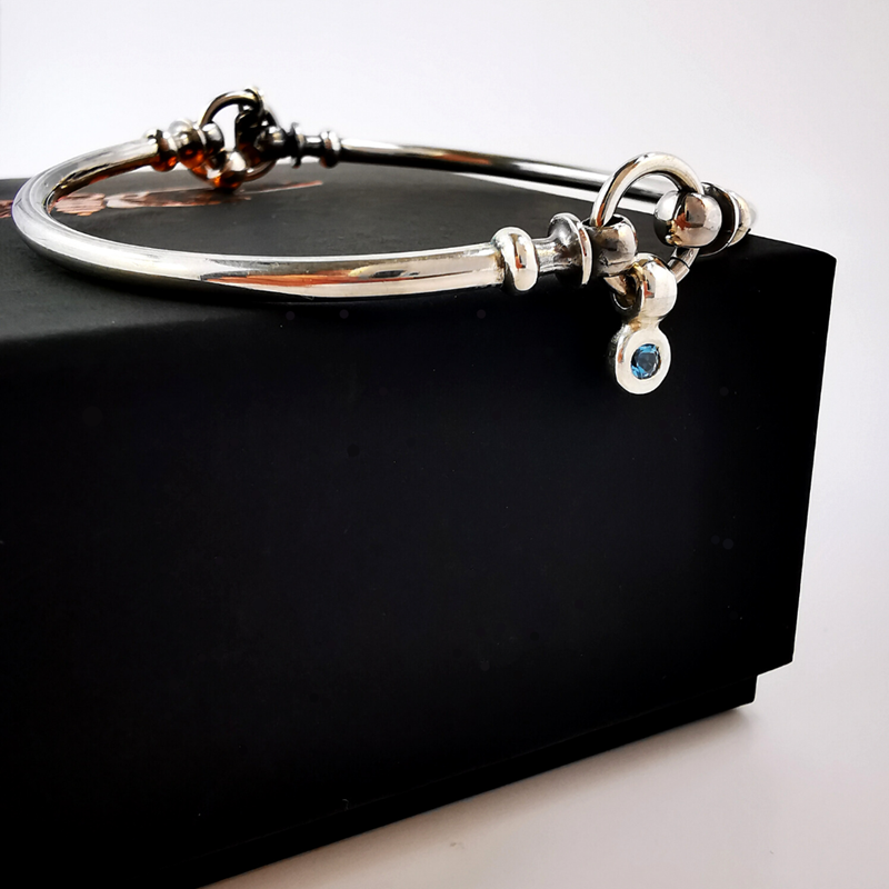 Thistle link bangle in sterling silver with blue topaz charm, Eltham, Melbourne, Australia