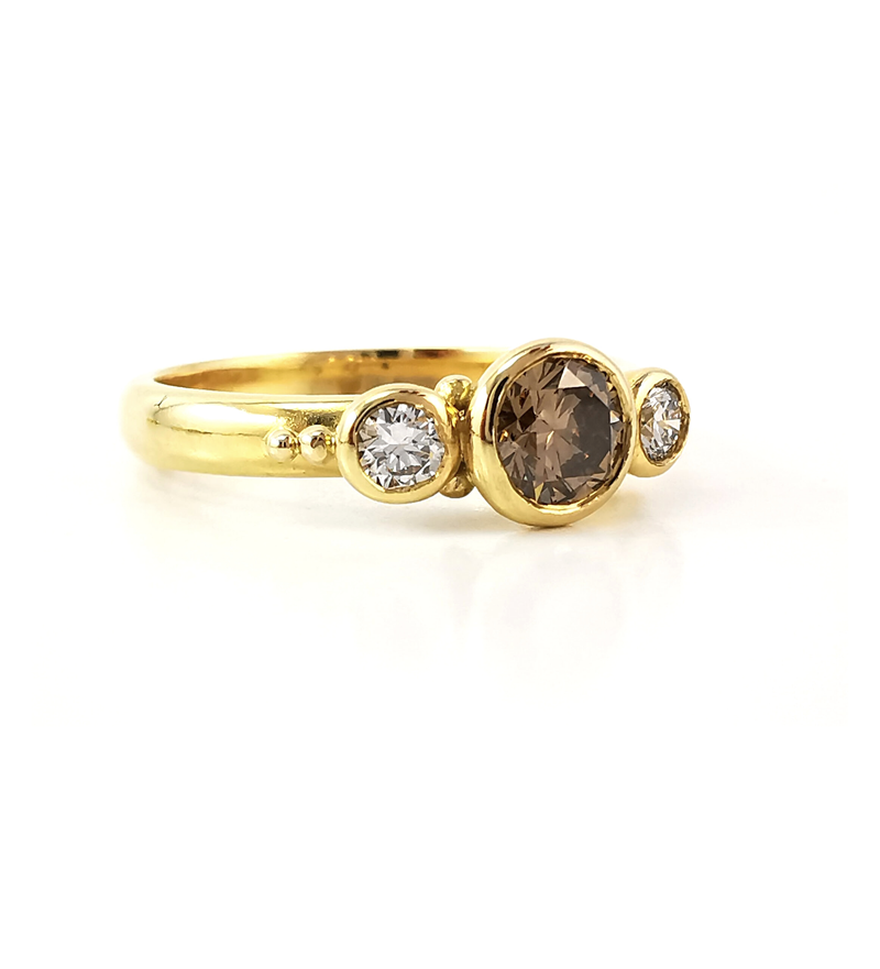 Three stone cognac and diamond ring, brilliant round centre stone cognac diamond, yellow, anniversary ring, engagement ring, handcrafted, Eltham, Melbourne, Australia, jeweller, online jewellery store, buy rings, ring shopping, trilogy rings, trilogy