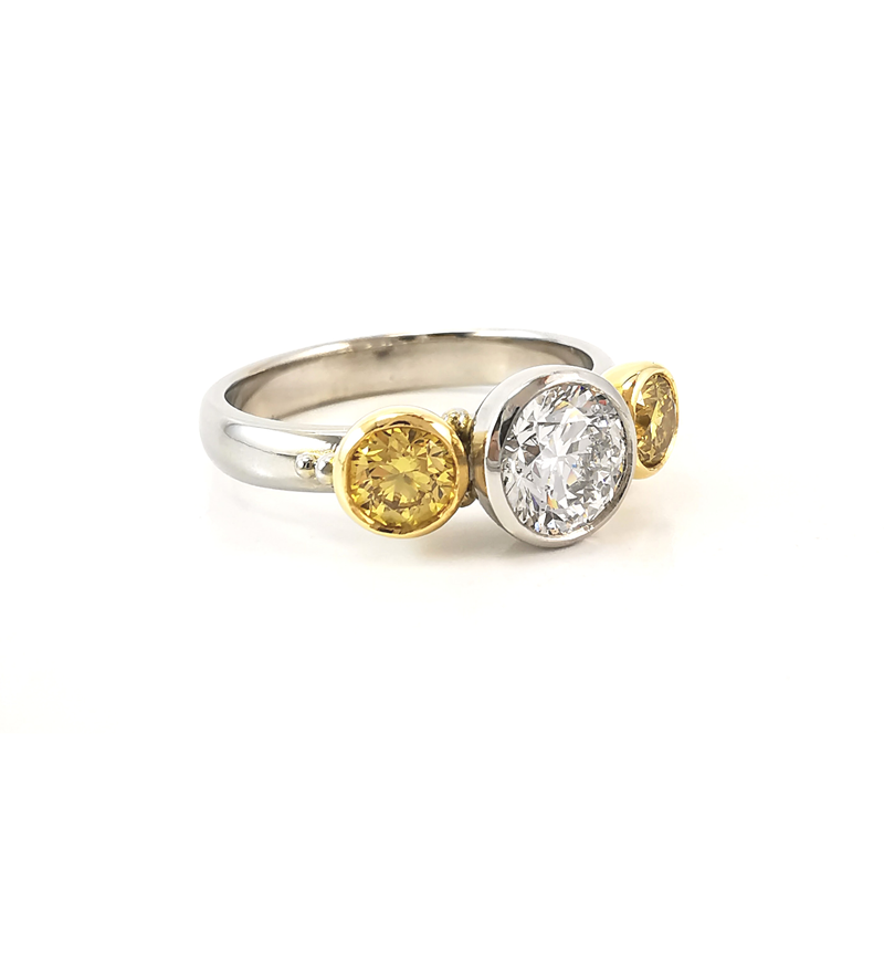 Three stone yellow and white diamond ring, brilliant round centre stone, yellow and white gold, anniversary ring, engagement ring, handcrafted, Eltham jewellers, Melbourne jewellers, Australia, trilogy rings, engagement ring ideas, online shopping