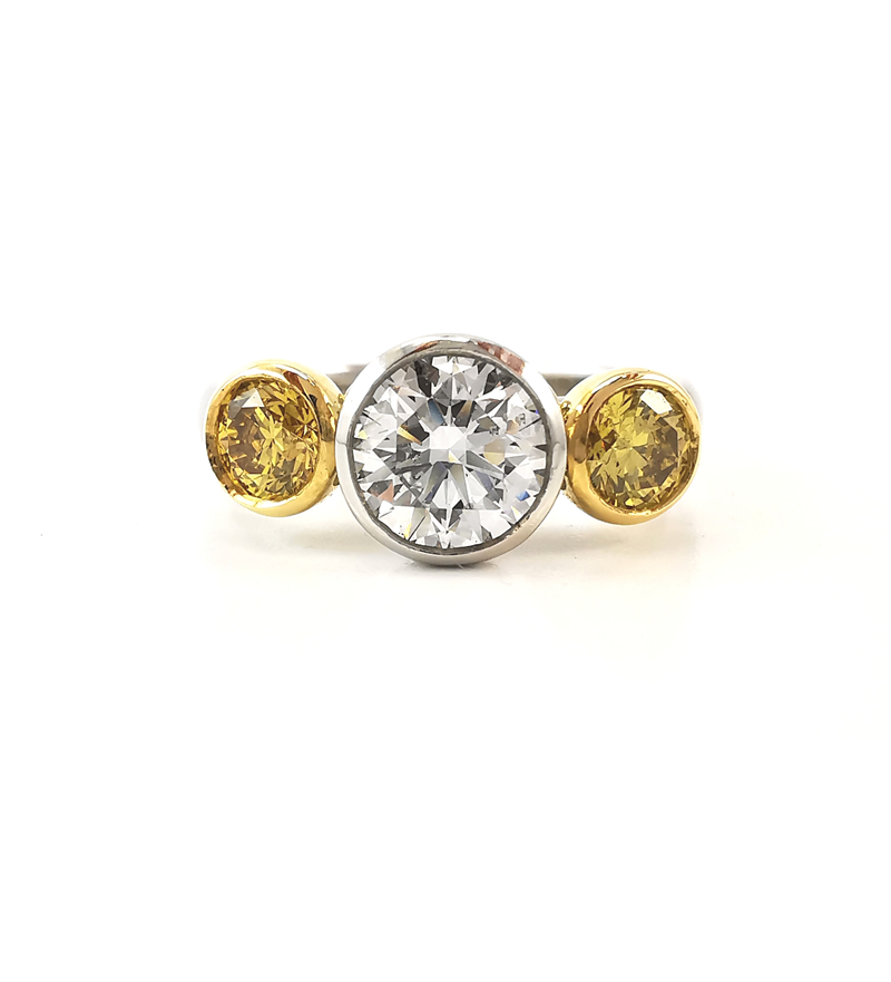 Three stone yellow and white diamond ring, brilliant round centre stone, yellow and white gold, anniversary ring, engagement ring, handcrafted, Eltham jewellers, Melbourne jewellers, Australia, trilogy rings, engagement ring ideas, online shopping